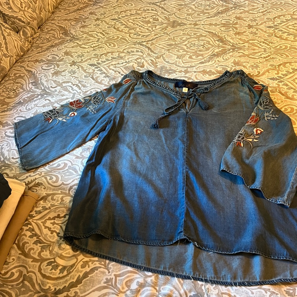 Beautiful women’s soft denim with embroidered detail on sleeve